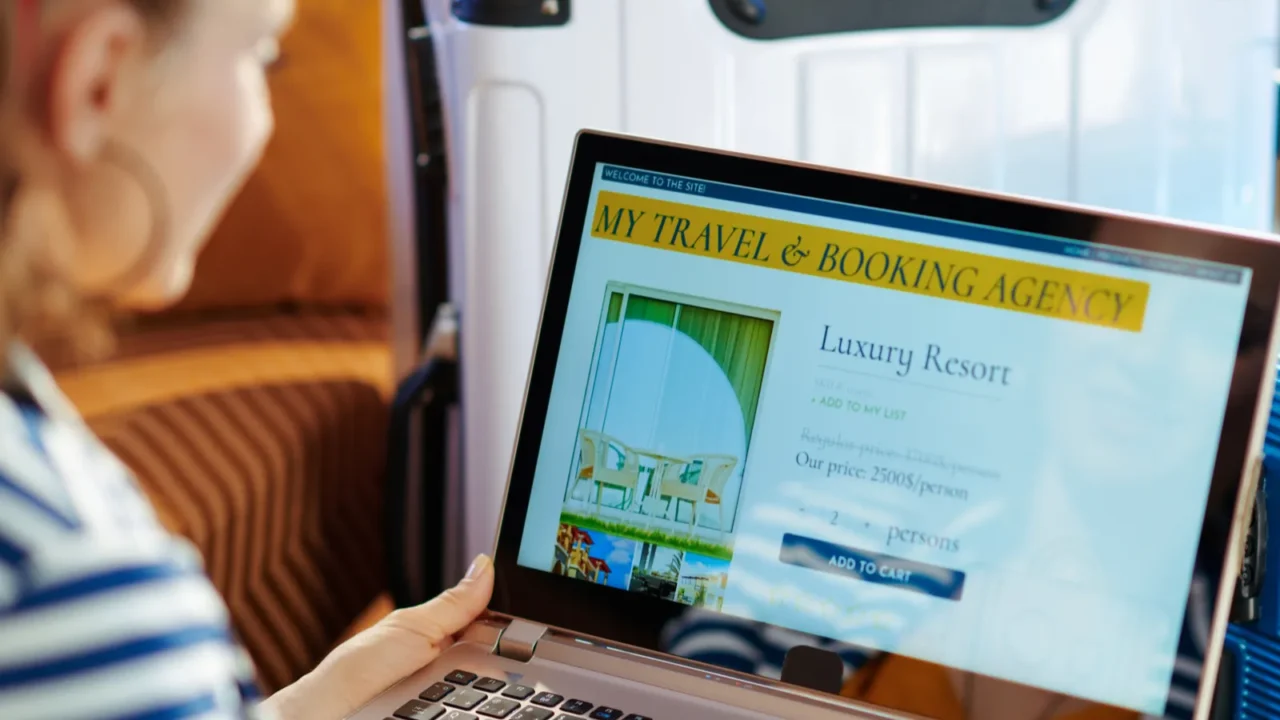 modern woman paying for hotel room on online booking website