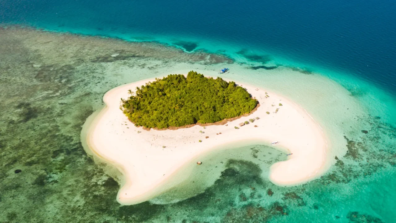 patawan island small tropical island with white sandy beach beautiful