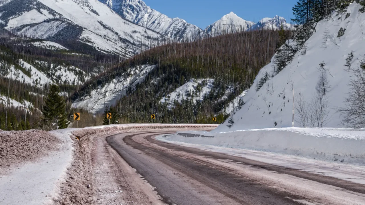 scenic winter drive in montana a snowy mountain road