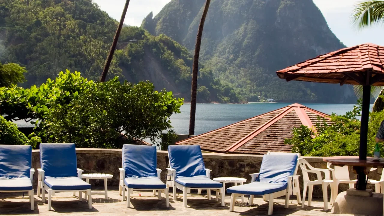 swimming pool view of piton mountains caribbean sea soufriere st
