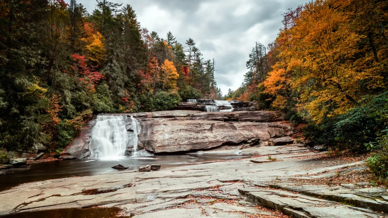 triple falls waterfall in fall color forest in the appalachian