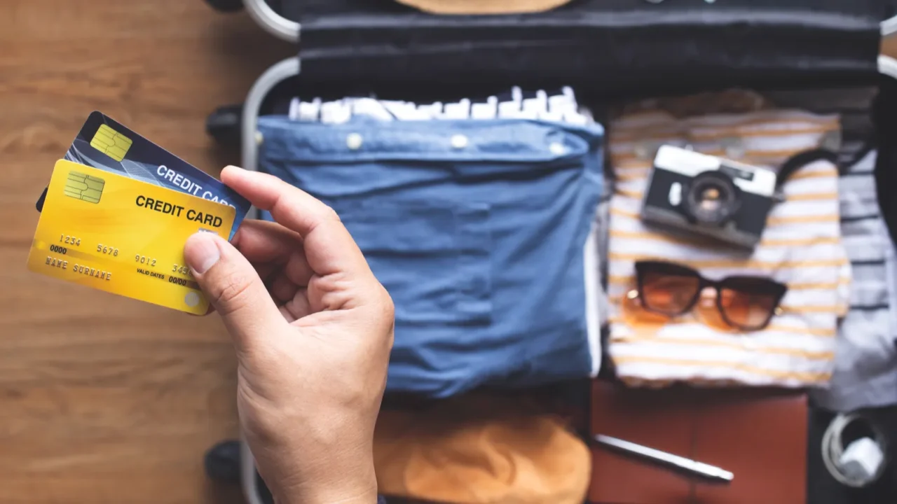 Young person using credit cards for payment on vacation or holiday trip.convenient lifestyle with technology.banking and financial.