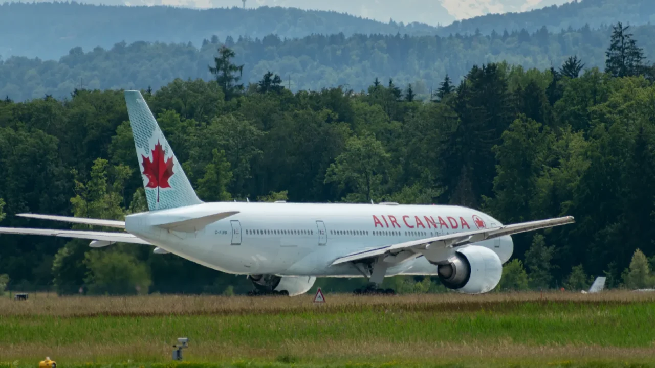 Air Canada Boeing 777-233LR aircraft is lining up on runway 16.
