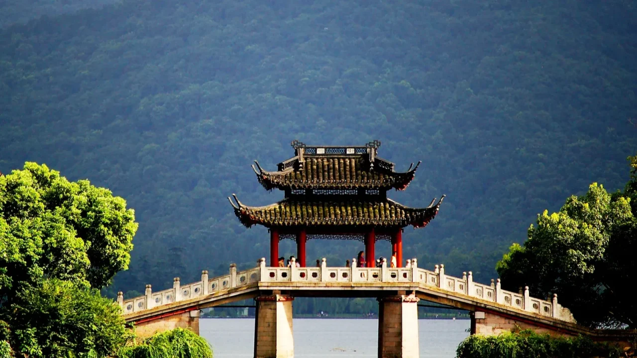 a pavilion bridge in west lake hangzhou china