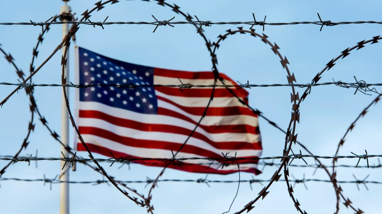 american flag and barbed wire usa border