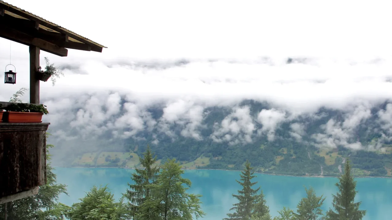 cafe near lake brienz in alps in fog weather