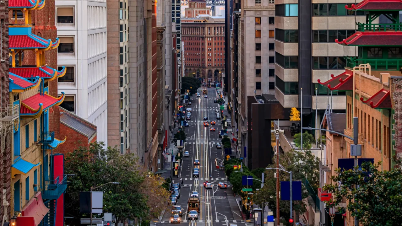 california street near china town with the bay bridge at