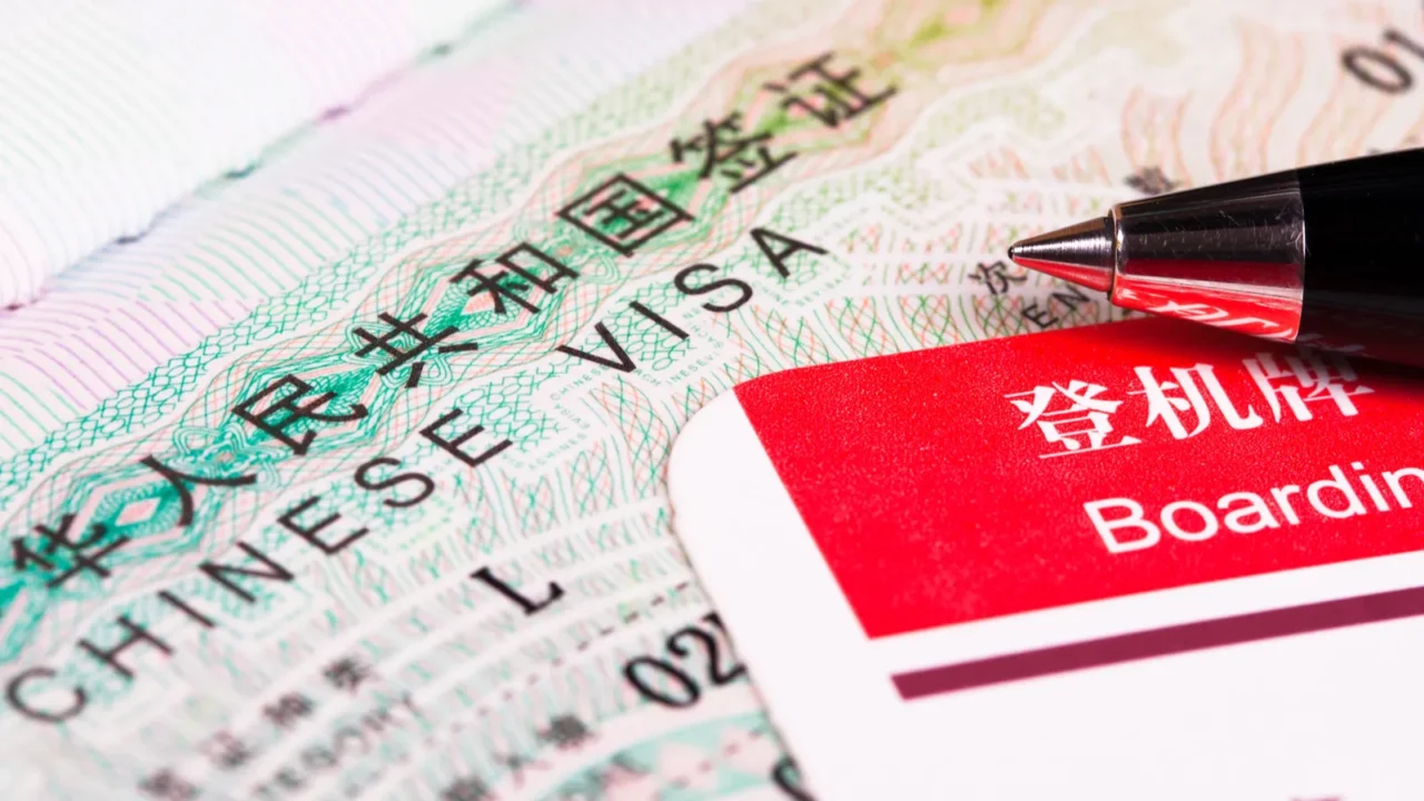 china visa in passport and boarding pass