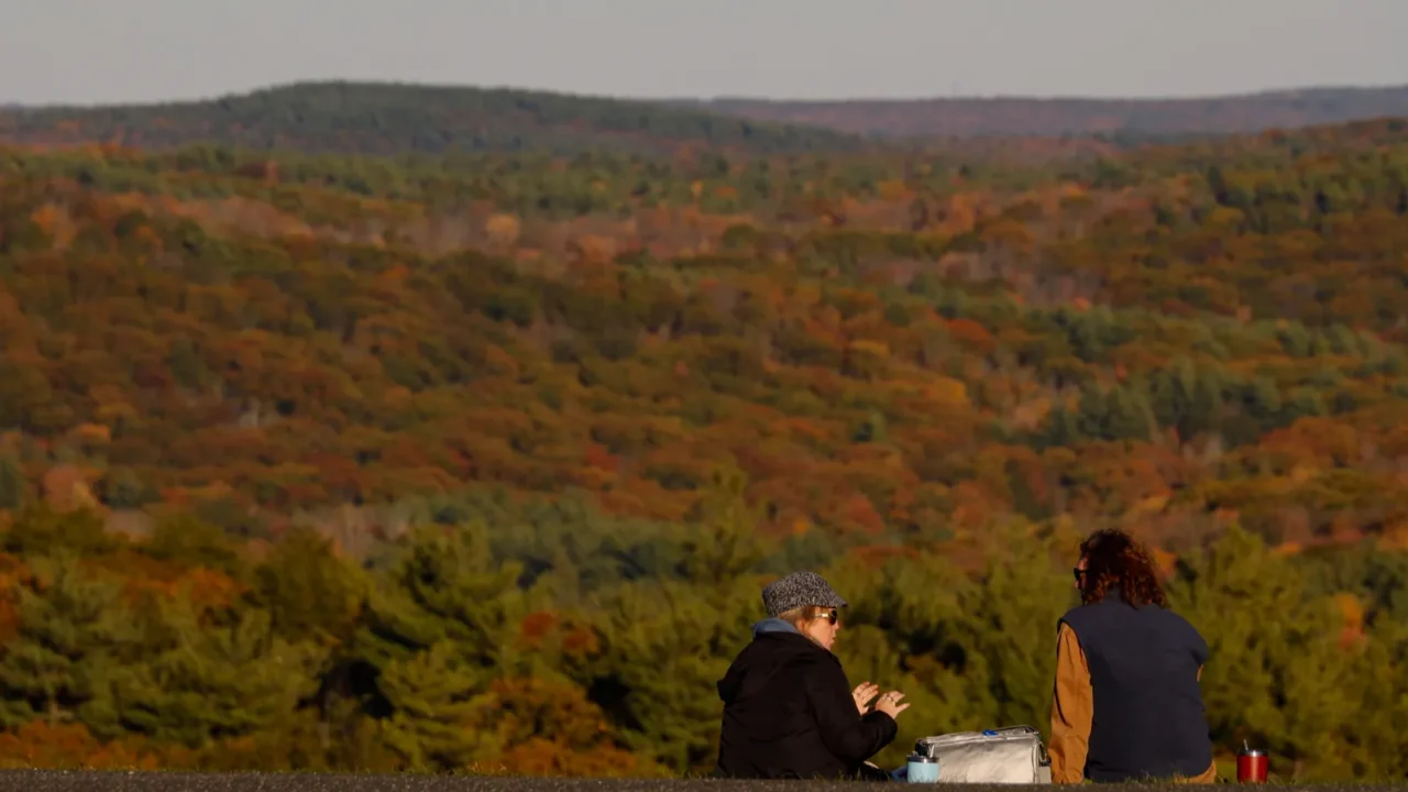 cornwall ct usa two people having a picnic with fall
