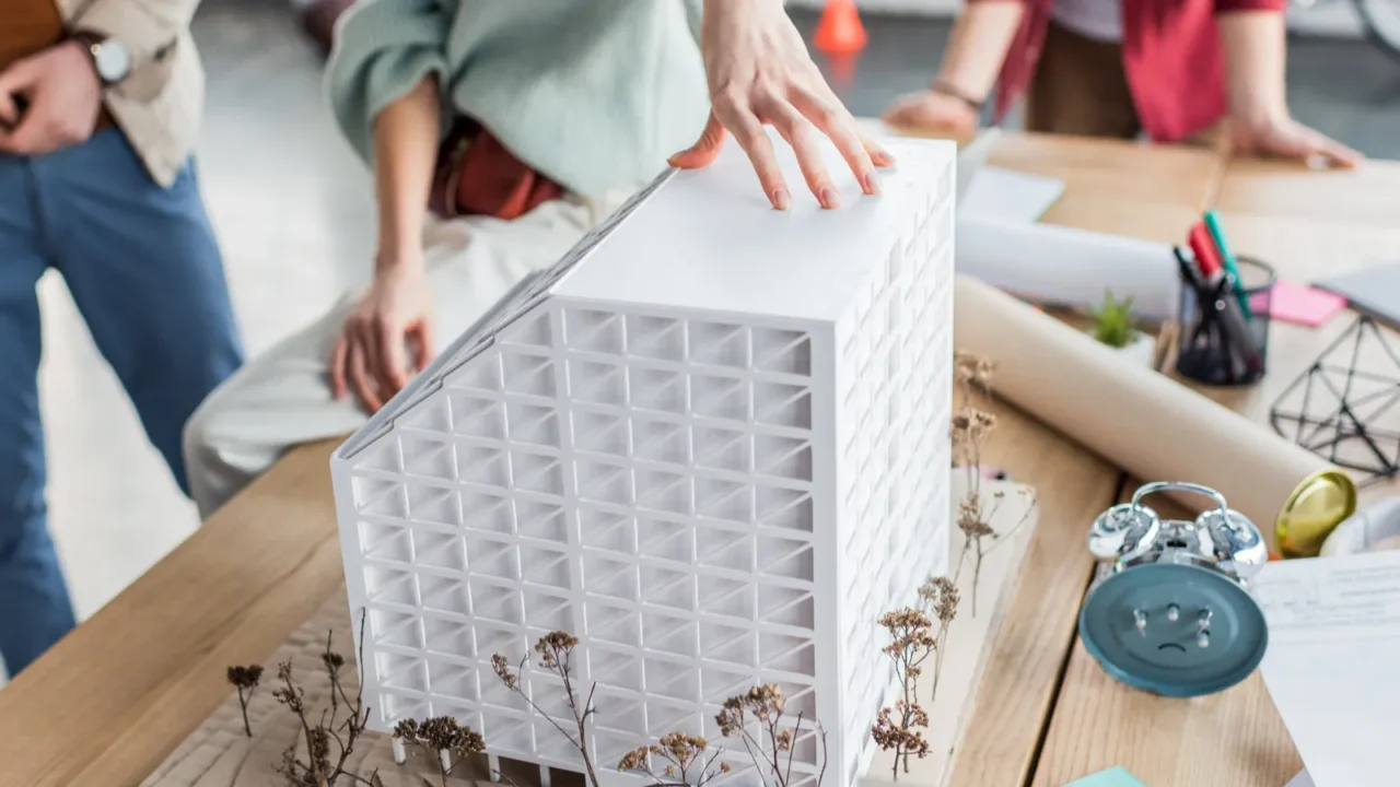 cropped view of group of female and male architects working