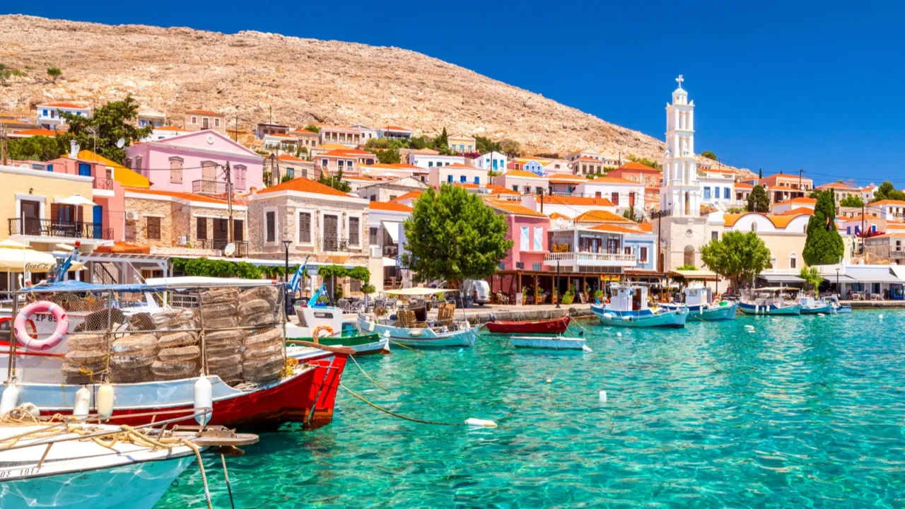 halki greece  july 6 2022 colorful houses and fishing
