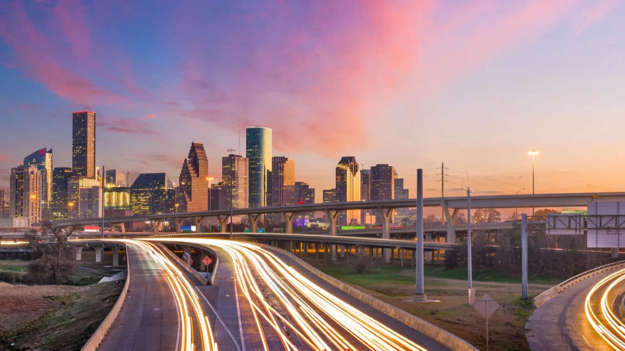 houston texas usa downtown skyline over the highways at dusk