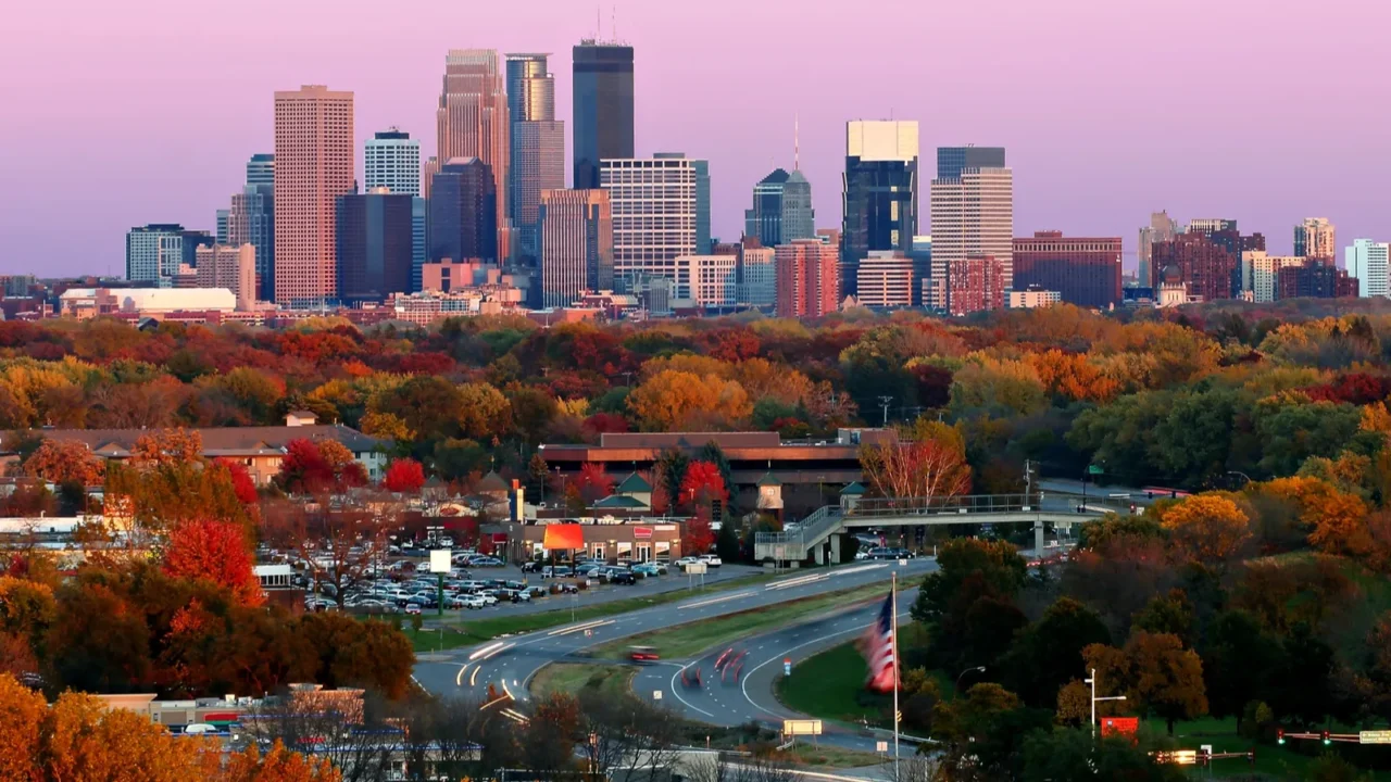 minneapolis skyline during autumn at sunset from plymouth minnesota