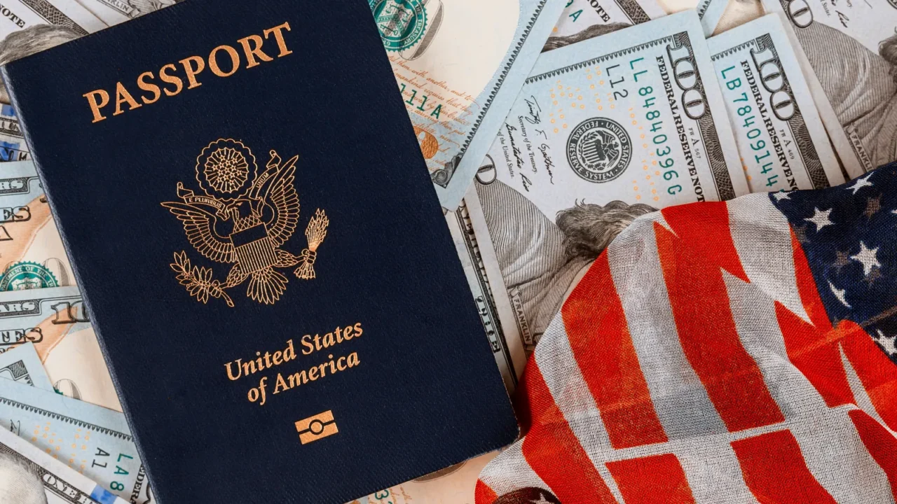 patriotic american passport on top of a pile of one