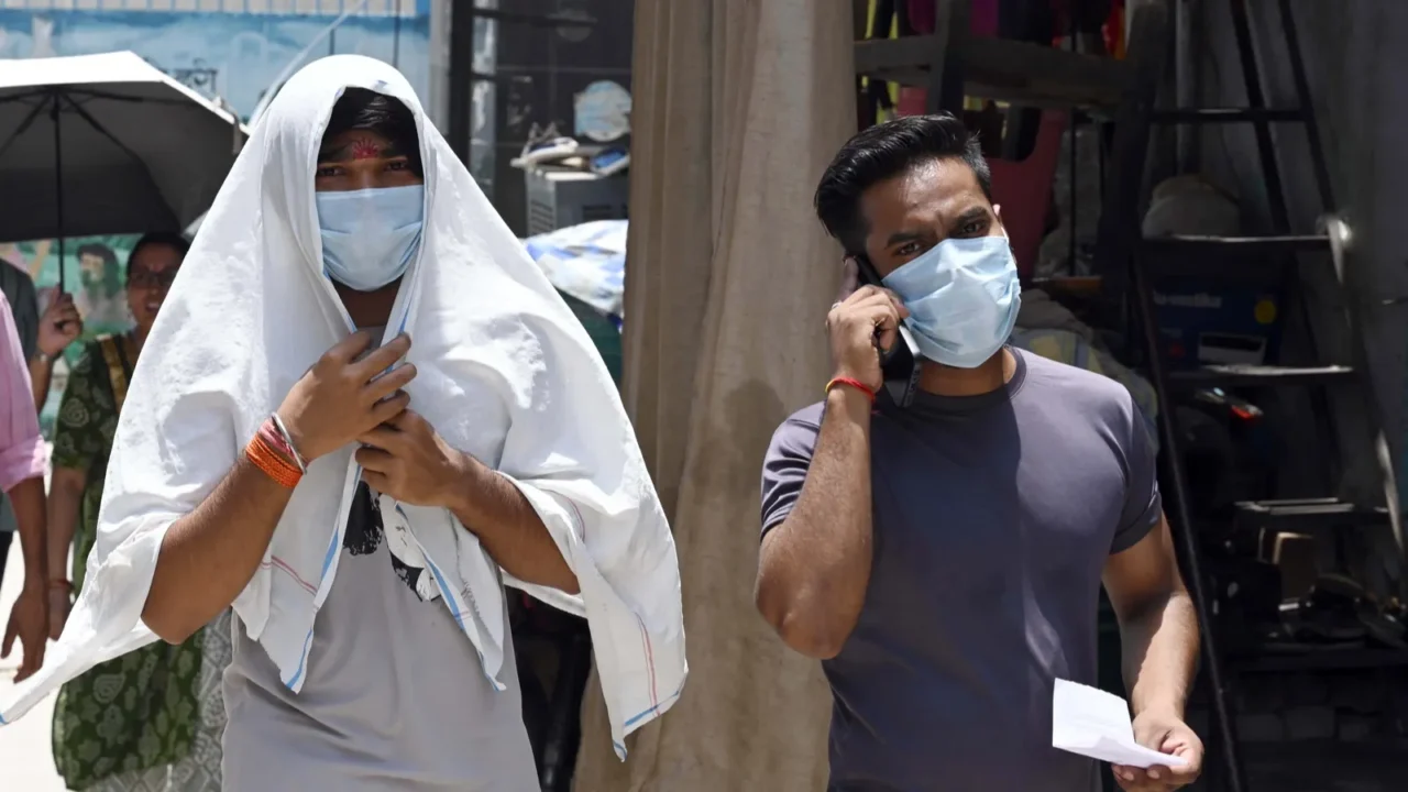 people seen inside a polling booth to cast their vote
