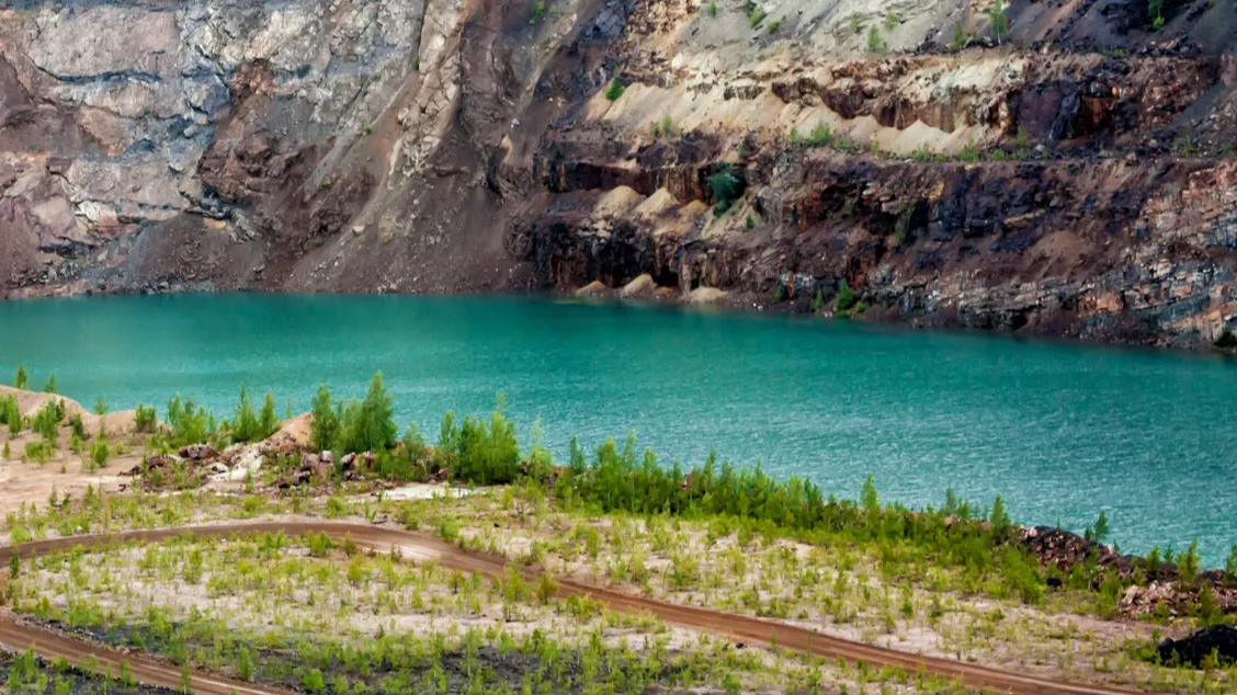 quarry flooded with turquoise water
