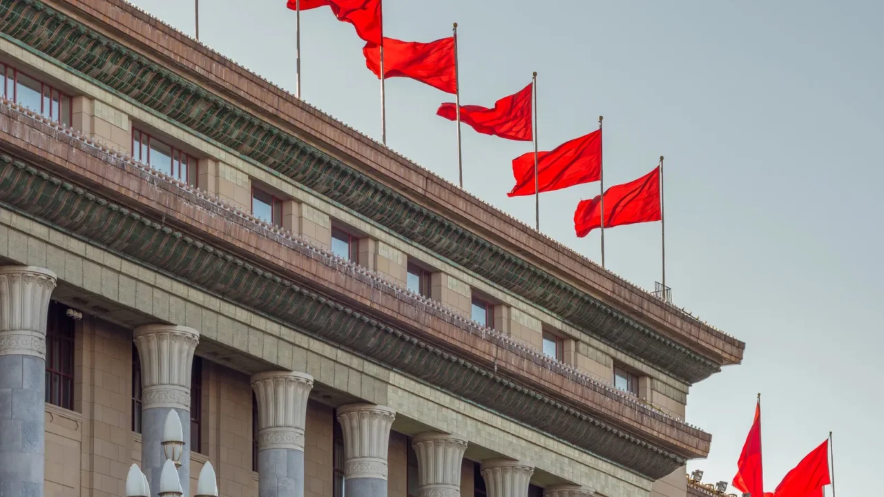 red banners atop the national peoples congress national legislature of