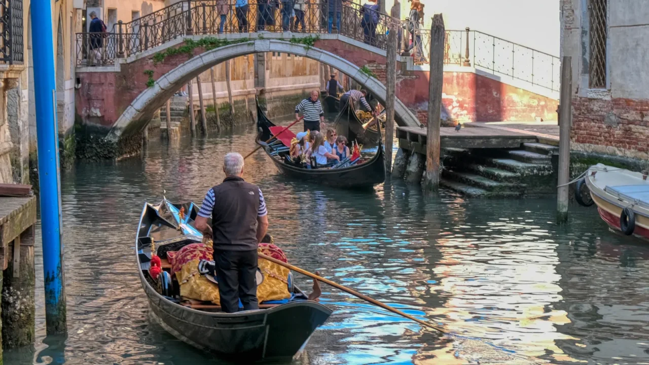 romantic gondola ride in the canals of venice italy