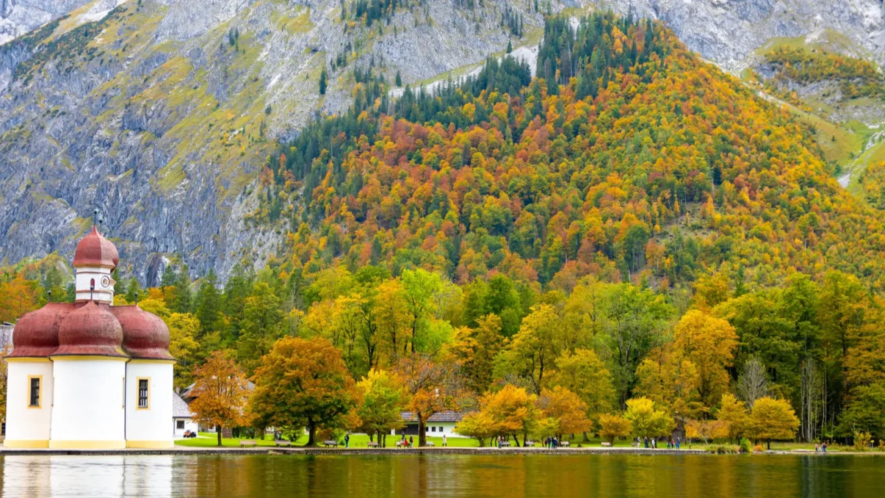 st bartholomews church on konigssee lake in berchtesgaden during fall