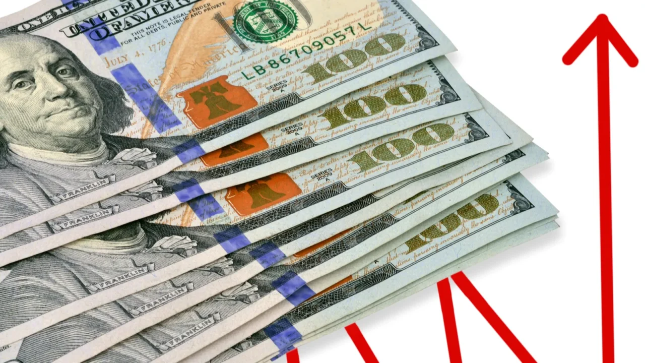 stack of hundred dollar bills us on white background