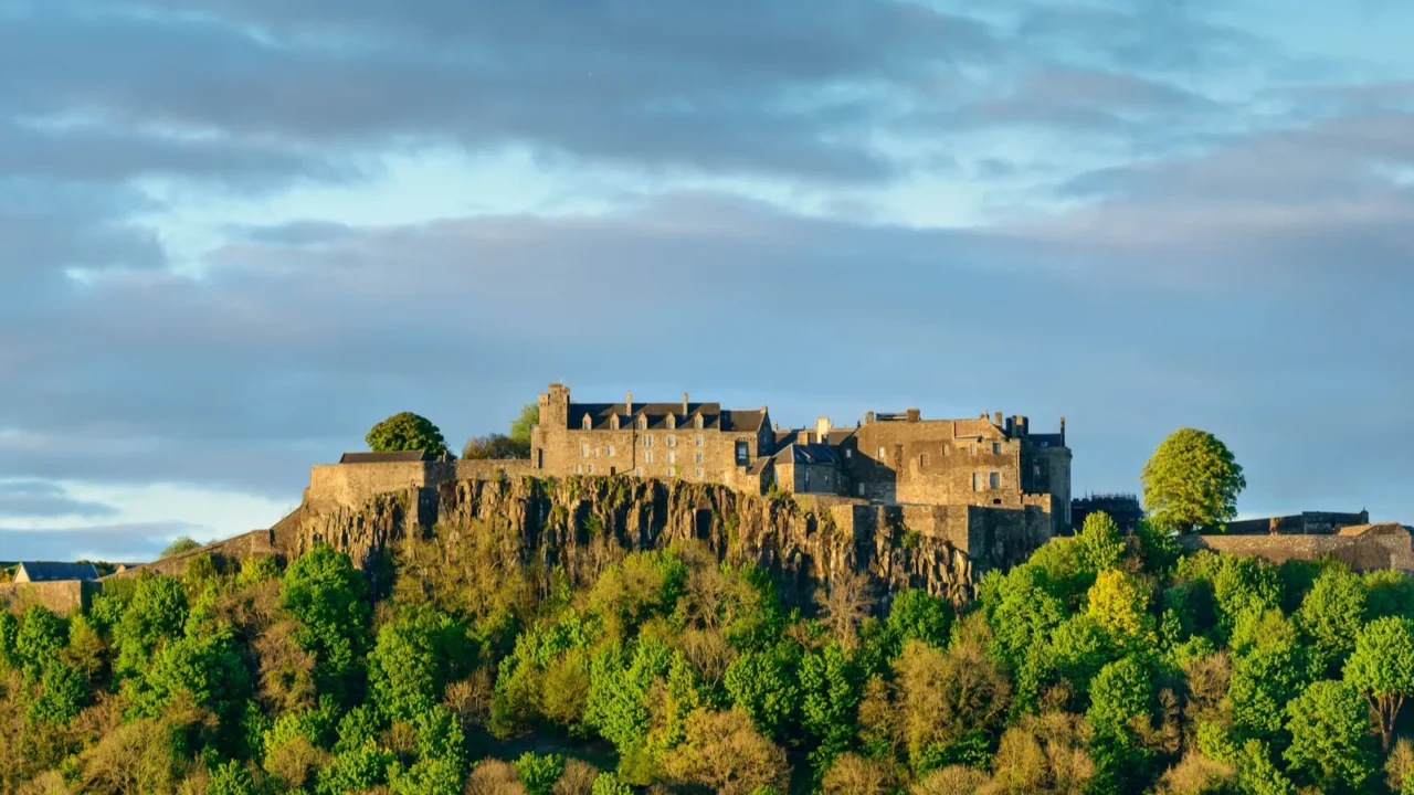 stirling castle in setting sunlight