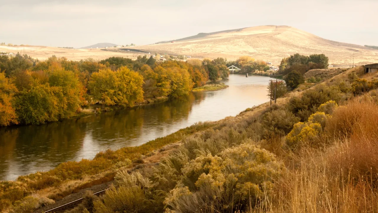 storm clearing over agricultural land yakima river central washington