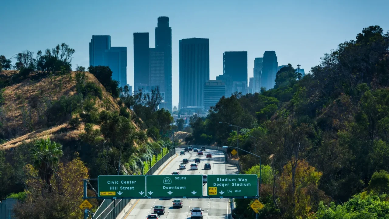 view of the 110 freeway and los angeles skyline from