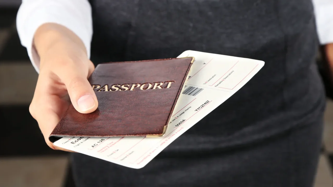woman holding passport