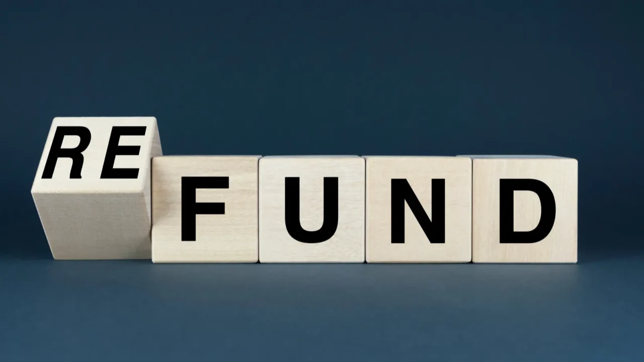 wooden blocks spelling fund  refund concept various business and
