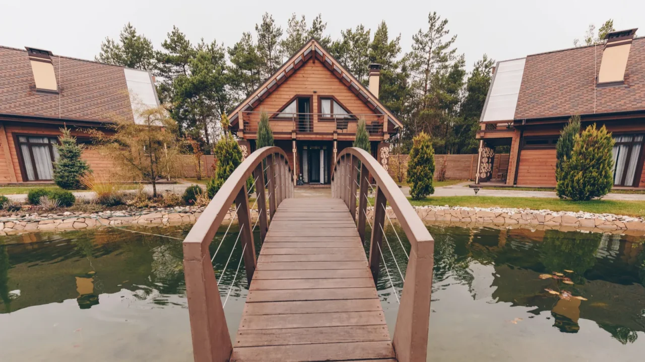 wooden bridge over pond