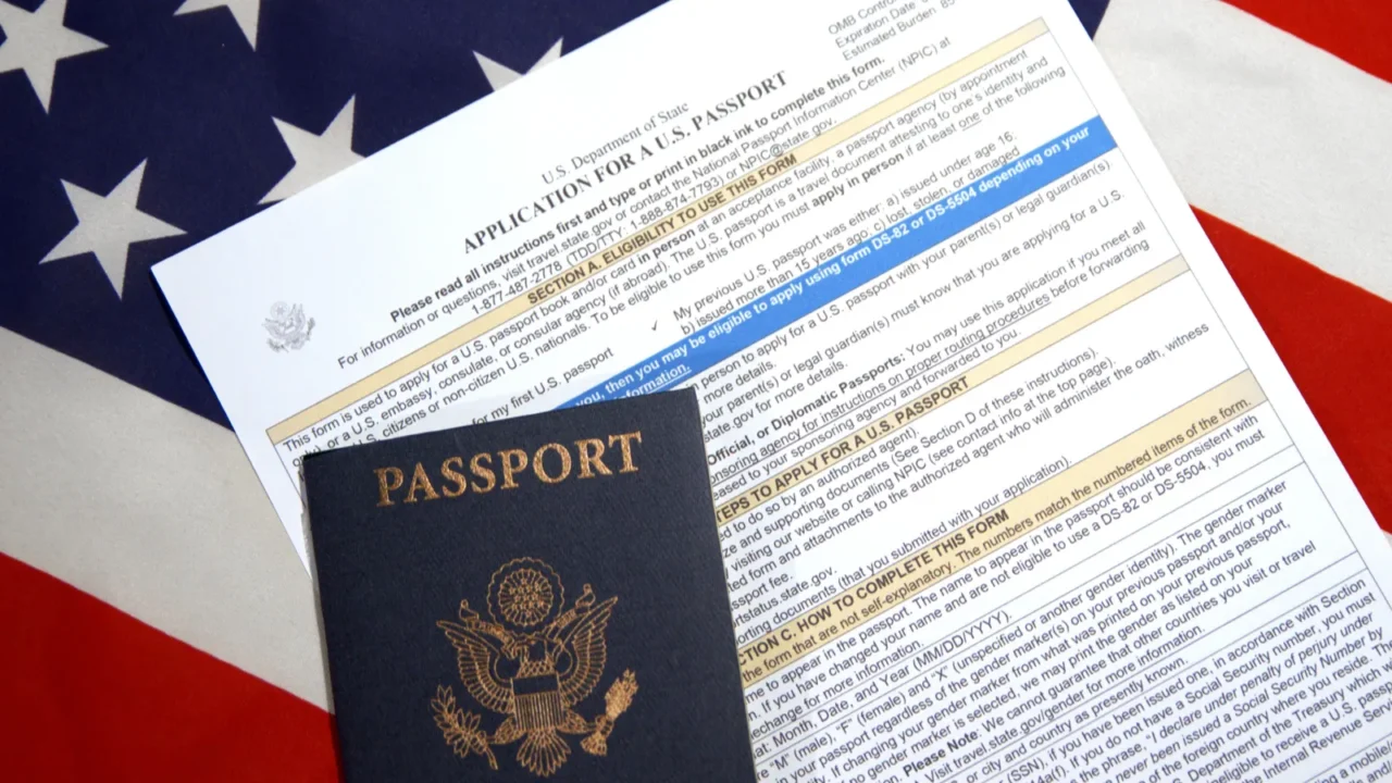 172025 united states american passport application concept with flag in
