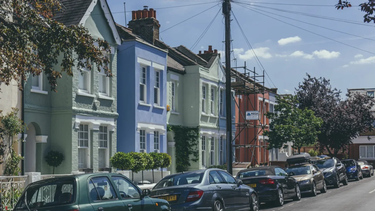 londonuk10818 pastelcolored terraced houses on white hart lane in barnes