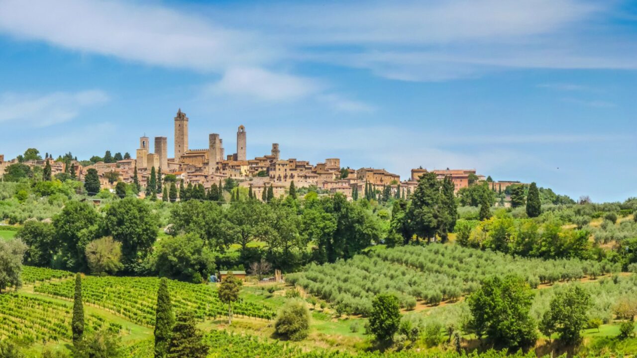Panoramic view of the medieval town of San Gimignano on a hill, Tuscany, Italy.