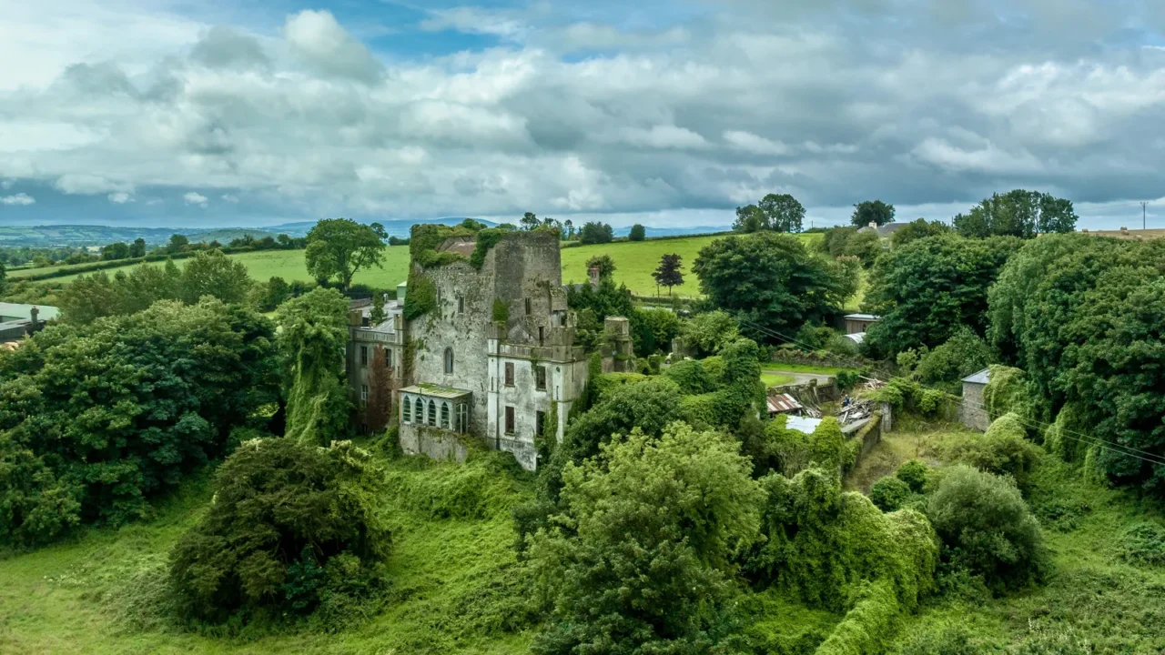 aerial view of leap castle with ruined donjon and castle