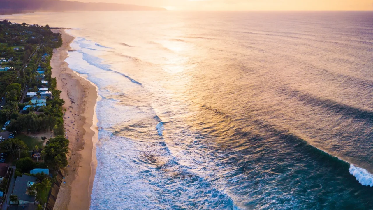 aerial view of the north shore of oahu at sunset