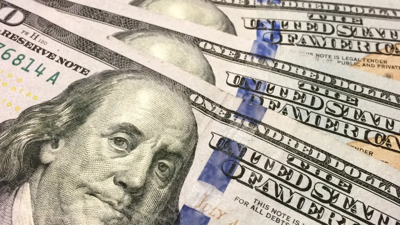 american one hundred dollar bills close up horizontal fanned out