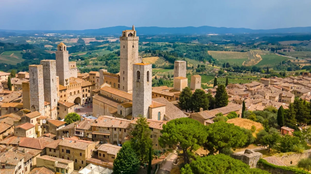 an aerial view of the san gimignano torre grossa with