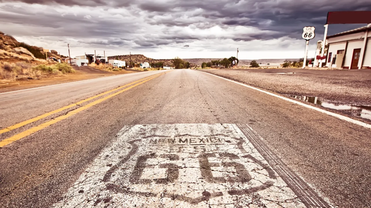 an old route 66 shield painted on road