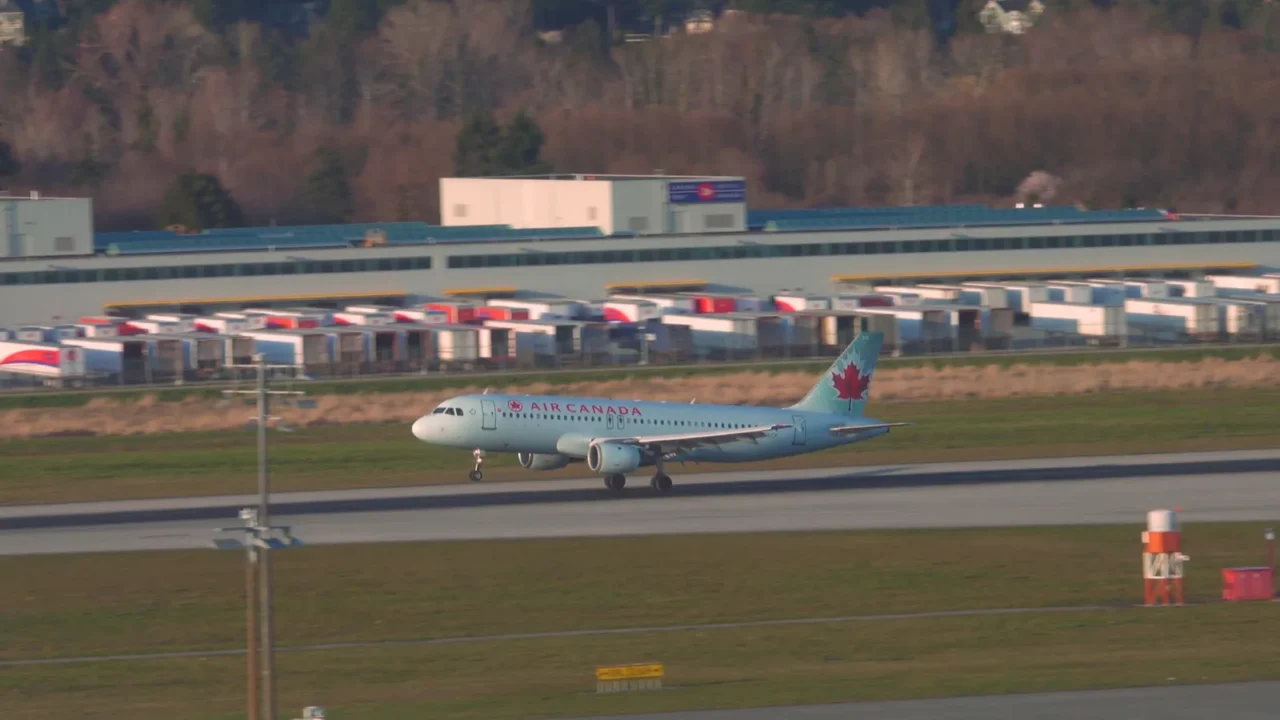 big passenger plane quickly approaches the runway and lands softly
