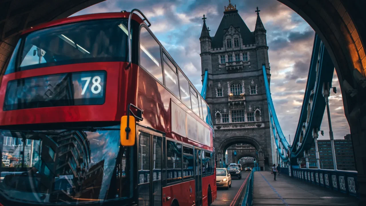 classic red double decker at the tower bridge in london