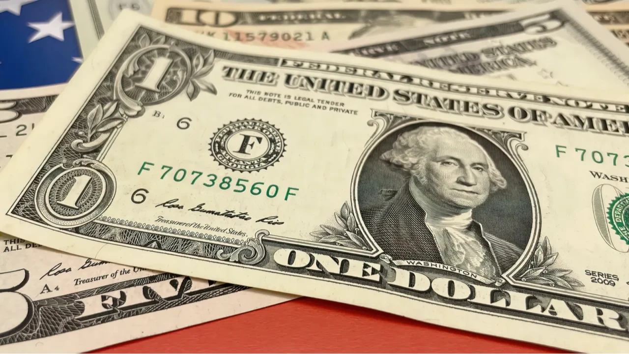 close up us dollar banknotes on background for finance and