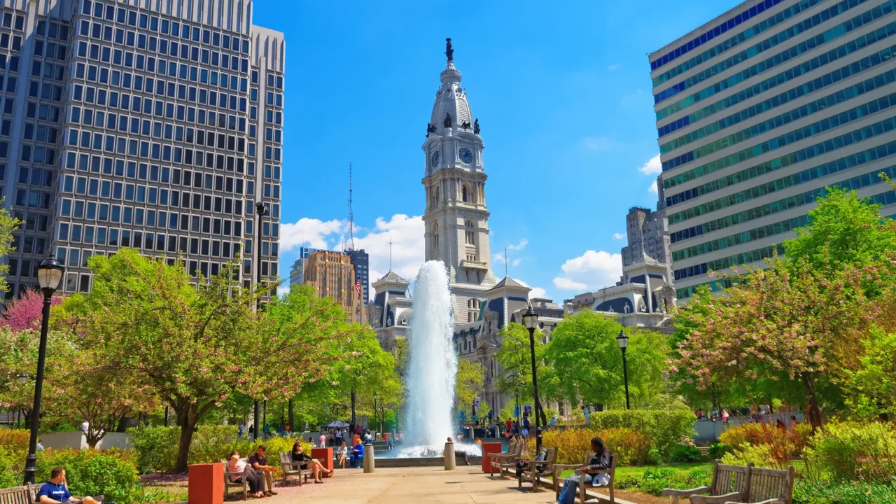 love park with fountain and philadelphia city hall on background