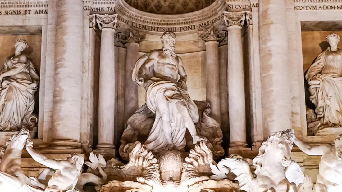 panoramic concept of trevi fountain with ancient sculptures in rome