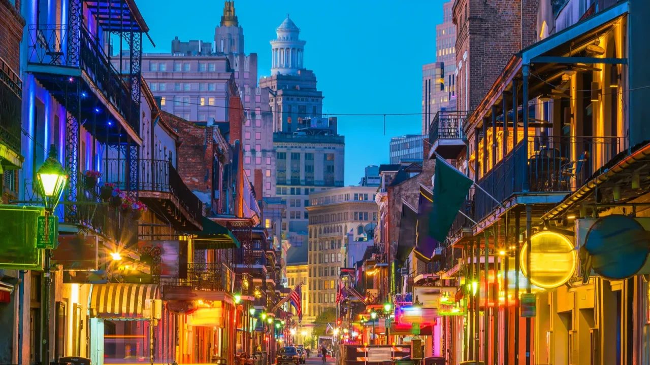 pubs and bars with neon lights in the french quarter