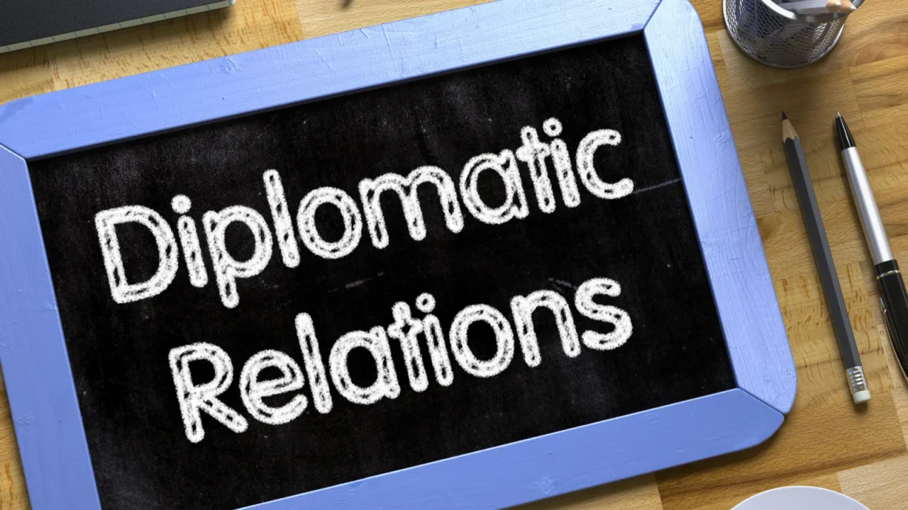 small chalkboard with diplomatic relations concept 3d