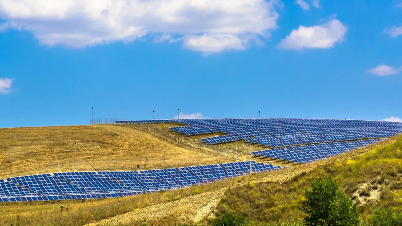solar panels in a hilly landscape