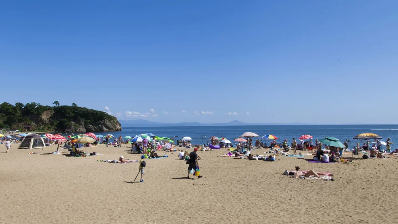 the sea and the beach in beams of the bright