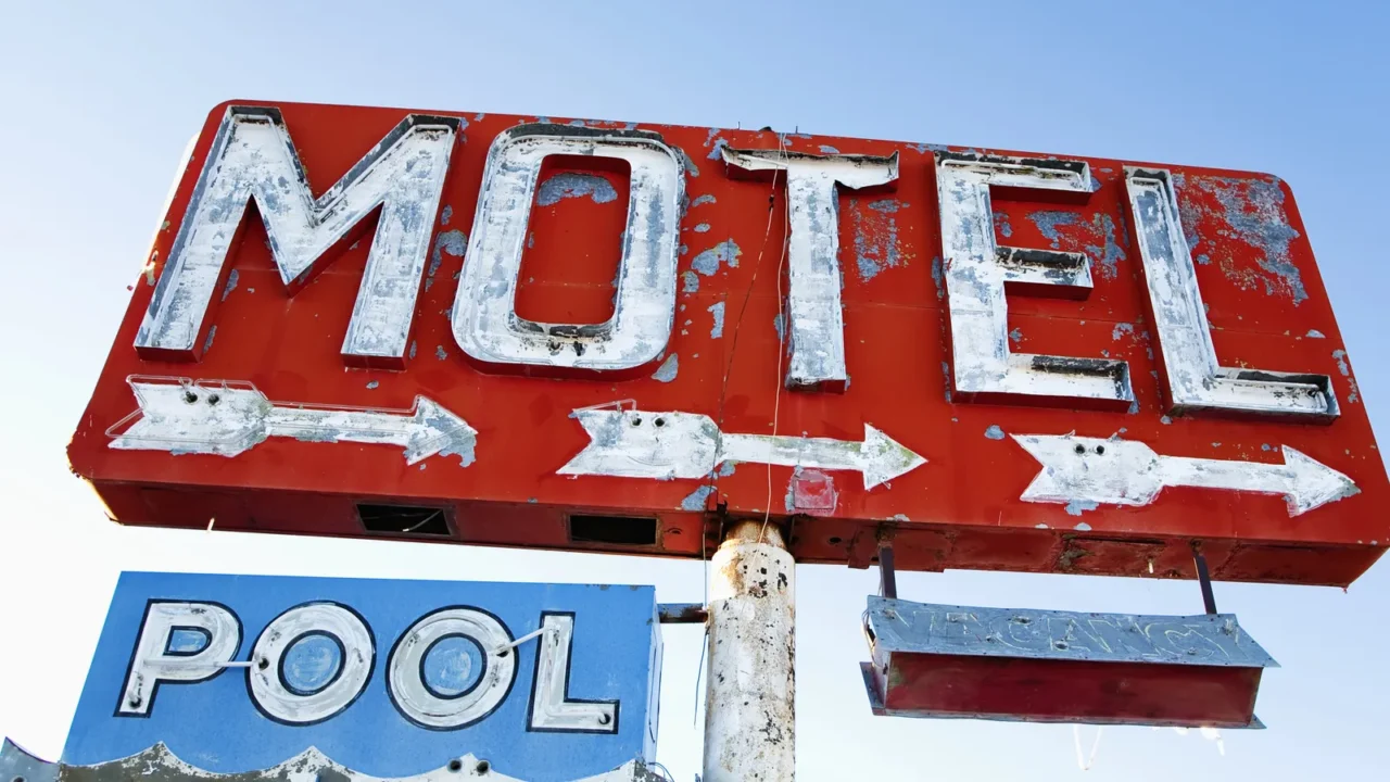weathered retro motel sign