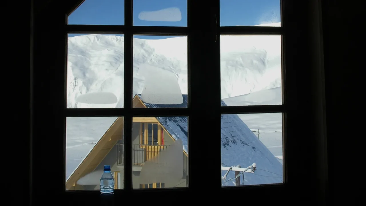winter mountains through the window