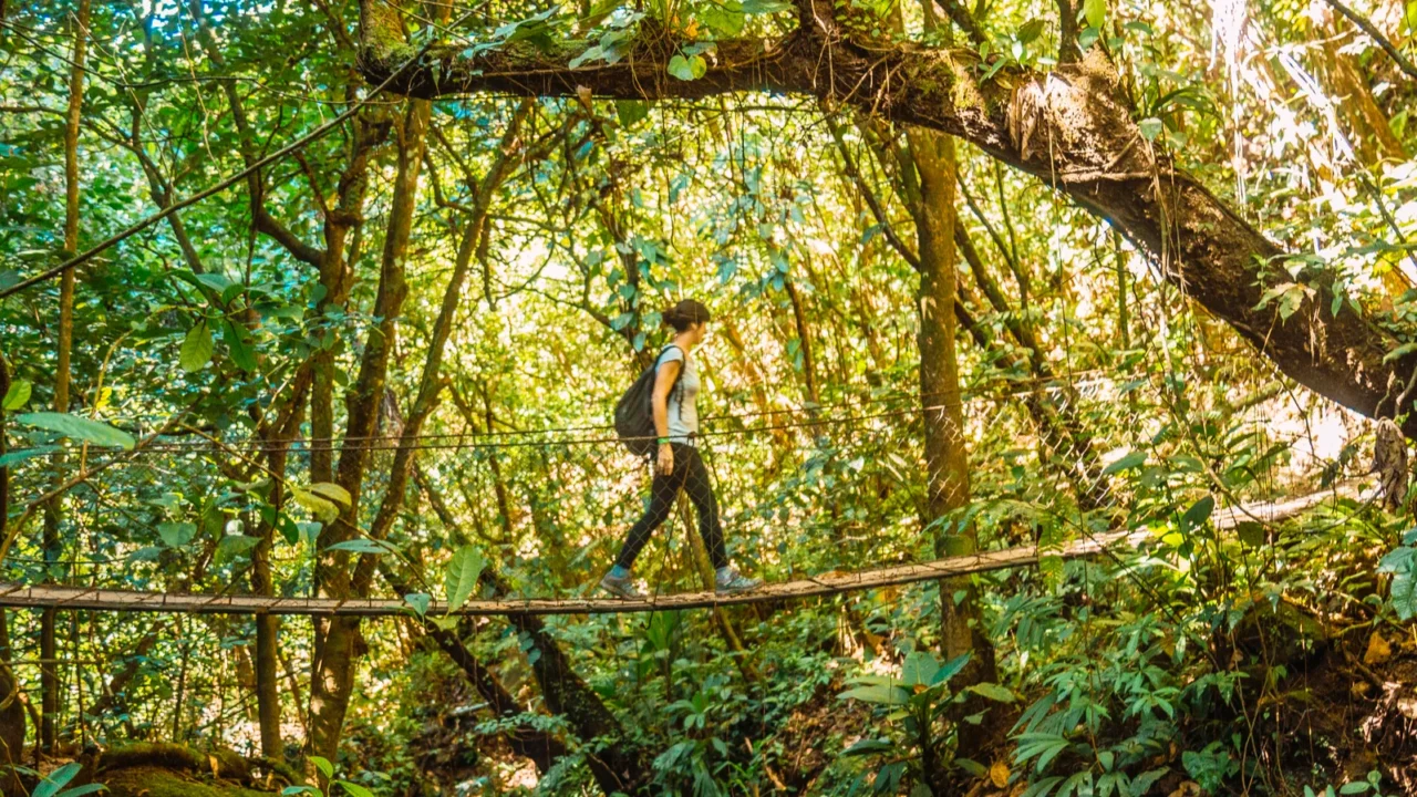 woman on a bridge in the cerro azul meambar national